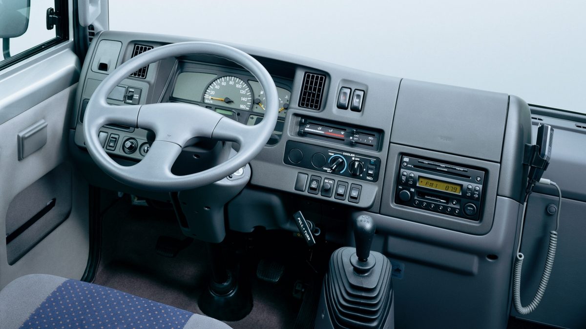 The dashboard, control panel and steering wheel of Nissan civilian